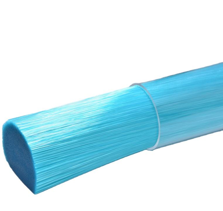 Which material is the most commonly used for wire brush filaments?